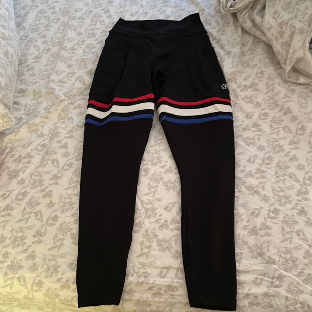 Bombshell sportswear thigh high leggings in black with red white and blue stripe
